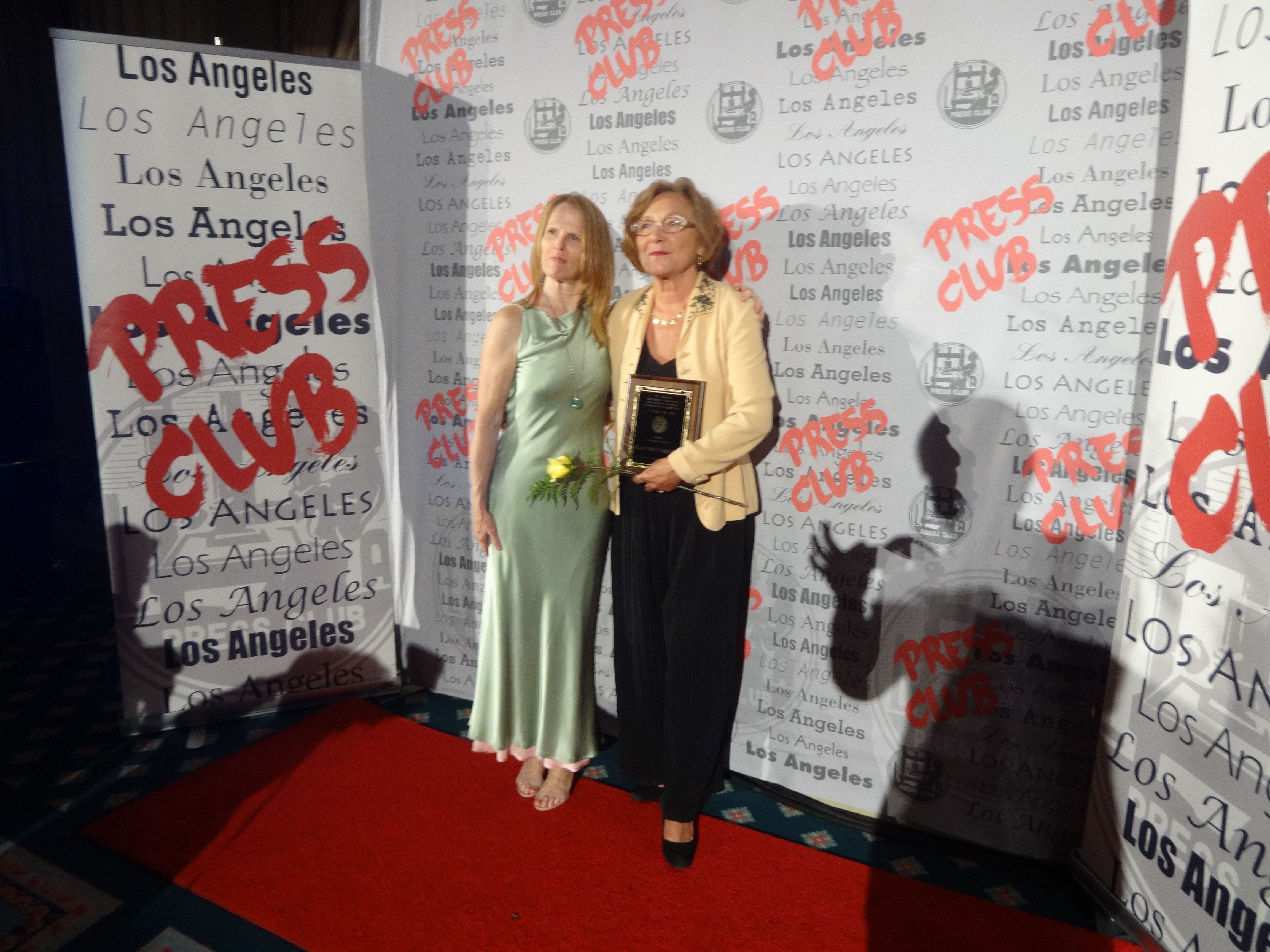 Winner, Southern California 55th Journalism Awards, News, International Journalism (Claudine Mulard receiving her award from Jill Stewart in June 2013)